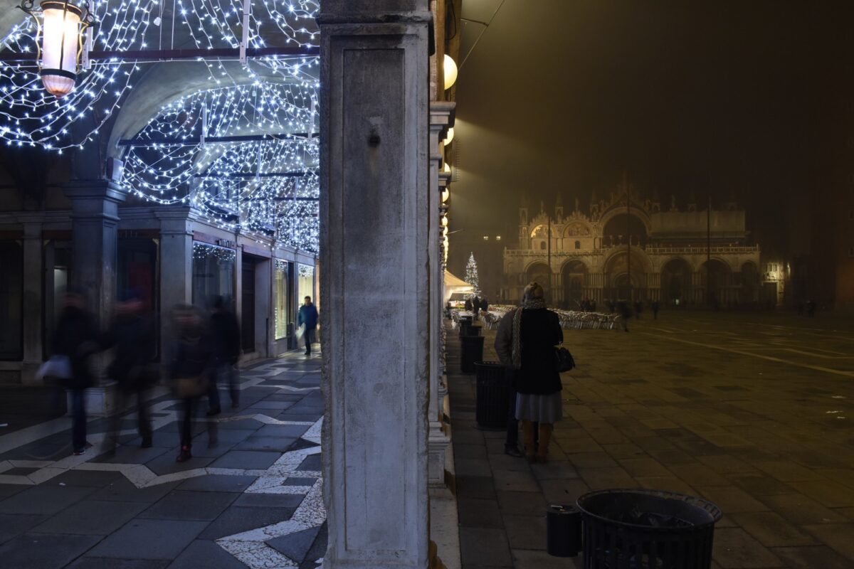 Saint Mark's square on a foggy evening around Christmas
