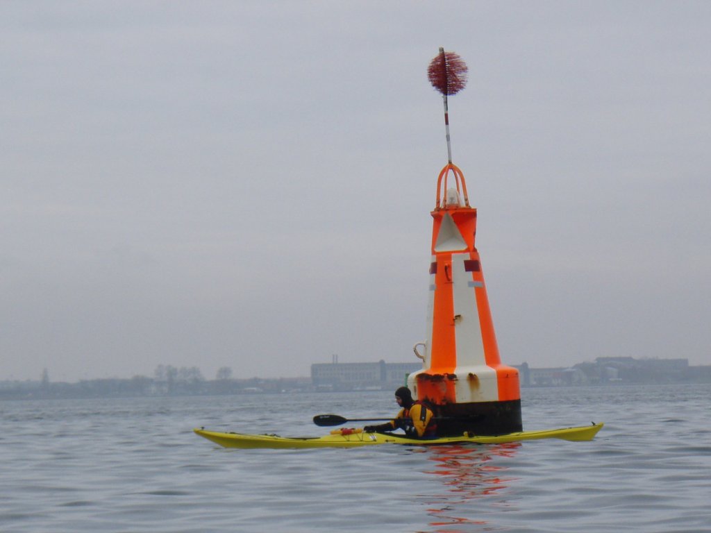 The white/orange buoy