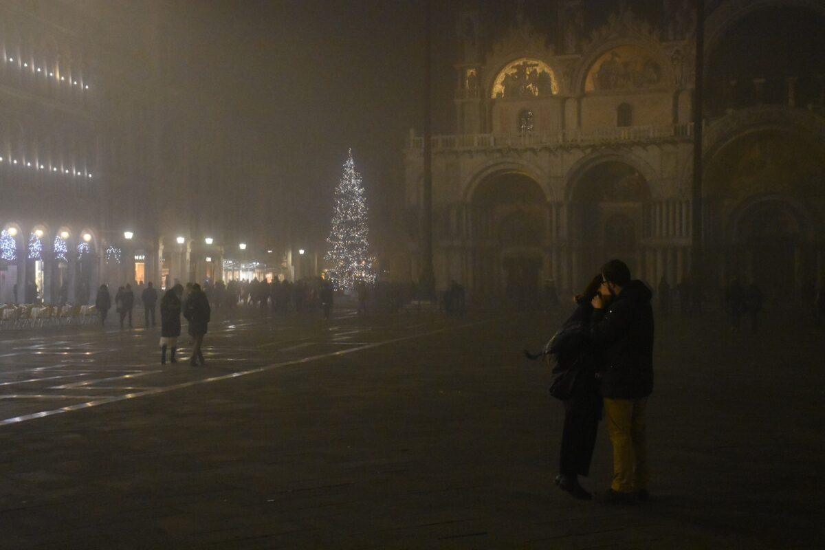 Couple kissing in St. Mark's