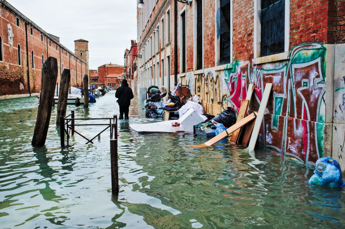 High tide in Venice - post-flood garbage piled up along the canal