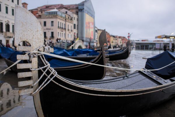 Gondolas left on land by the tide