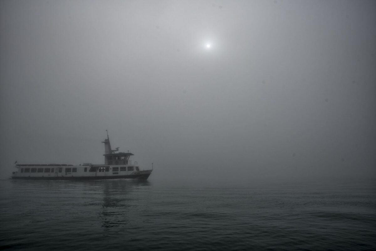 The Venetian lagoon on the fog - motonave