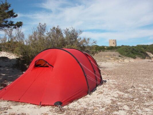 Our tent with a Spanish watch tower