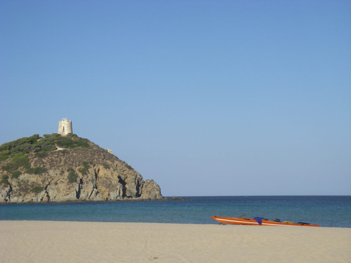 Beach with Spanish tower at Chia, Sardinia
